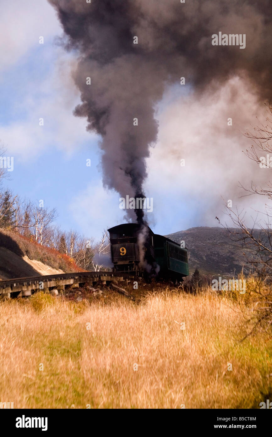 The steam engine of the cog railway is seen on its climb up Mount Washington in New Hampshire, USA. Stock Photo