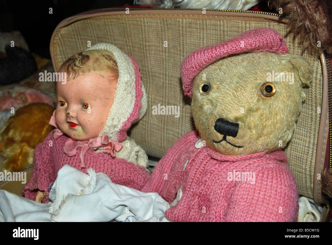 Antique doll and Chilton teddy bear.  Newark, Nottinghamshire, England. Stock Photo