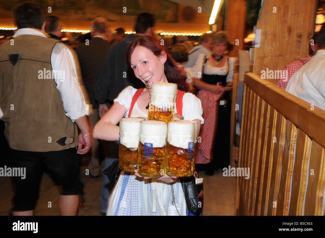Oktoberfest MunichOktoberfest waitress carrying beers Stock Photo - Alamy
