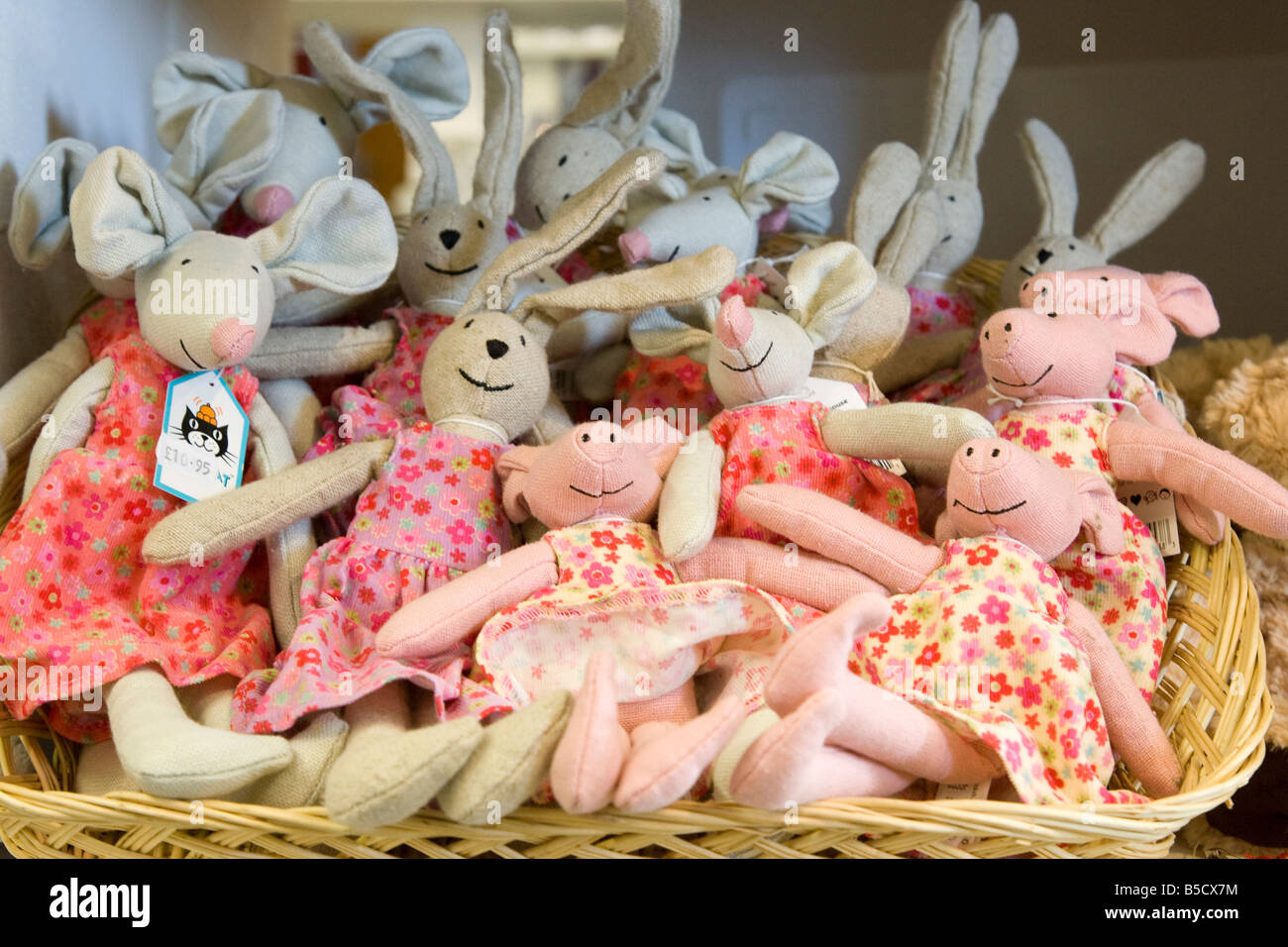 cute cuddly childrens toys in a shop on display Stock Photo