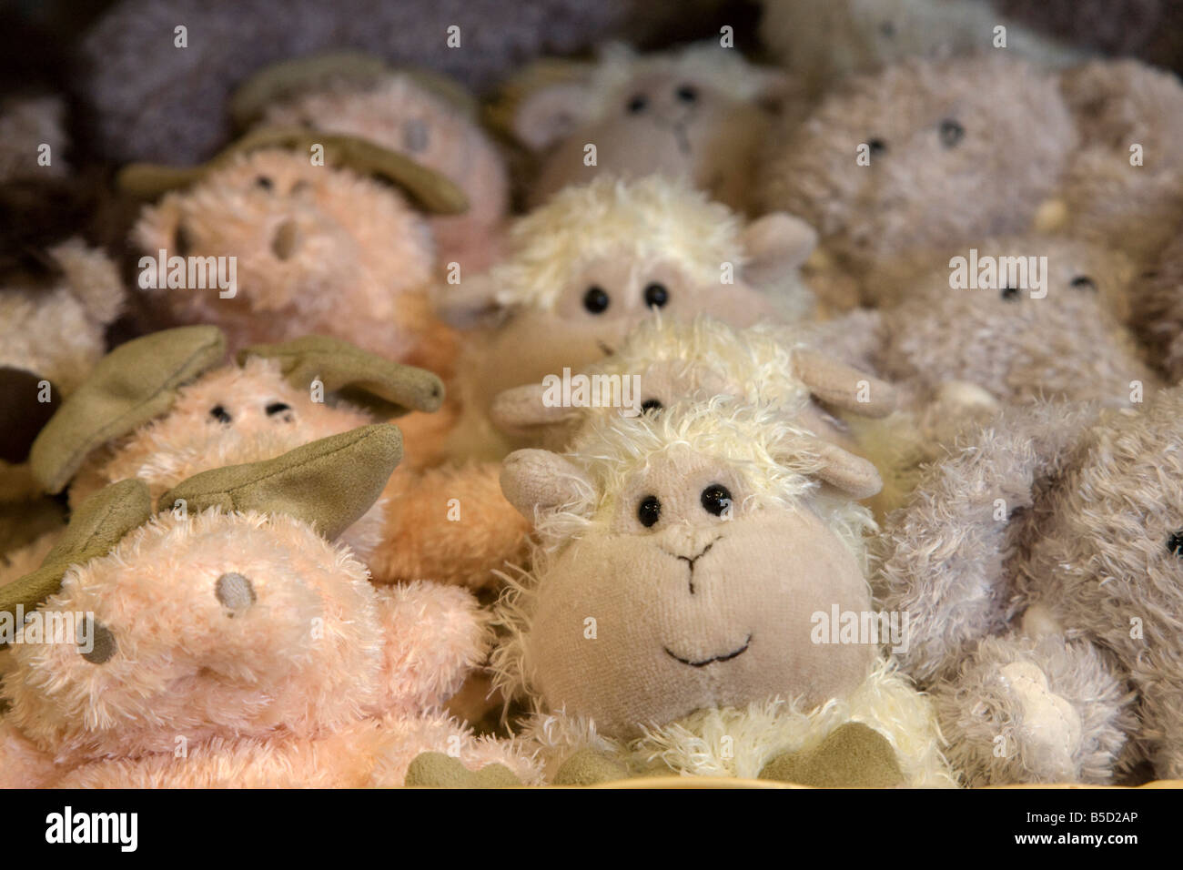 cute cuddly childrens toys in a shop on display Stock Photo