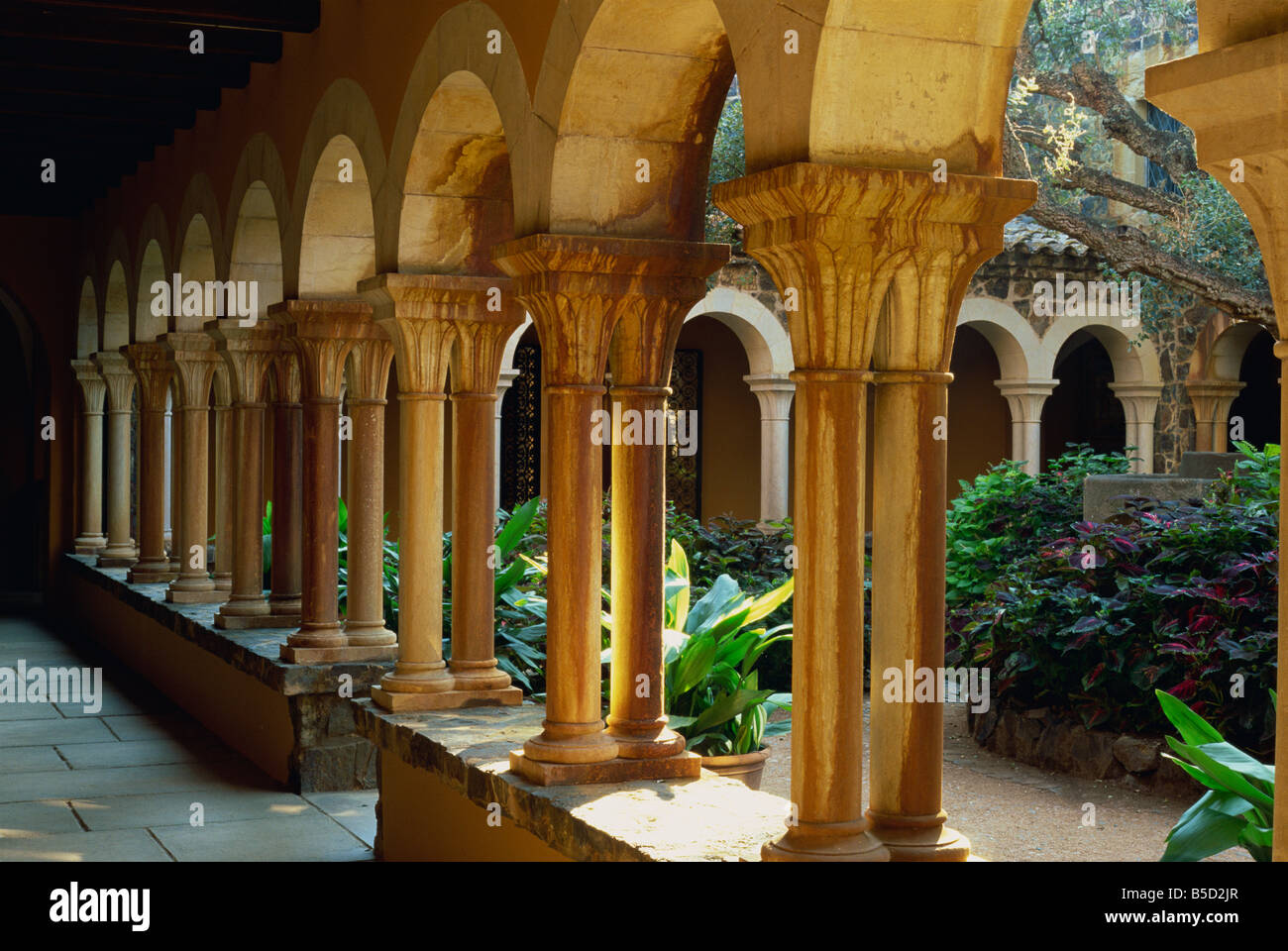Pillars lining castle courtyard, Cap Roig Botanical Gardens, Calella de