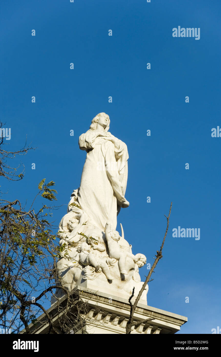 Baroque statue celebrating survival of eathquake 1755, Plaza del Triunfo, Santa Cruz district, Seville, Andalusia, Spain Stock Photo