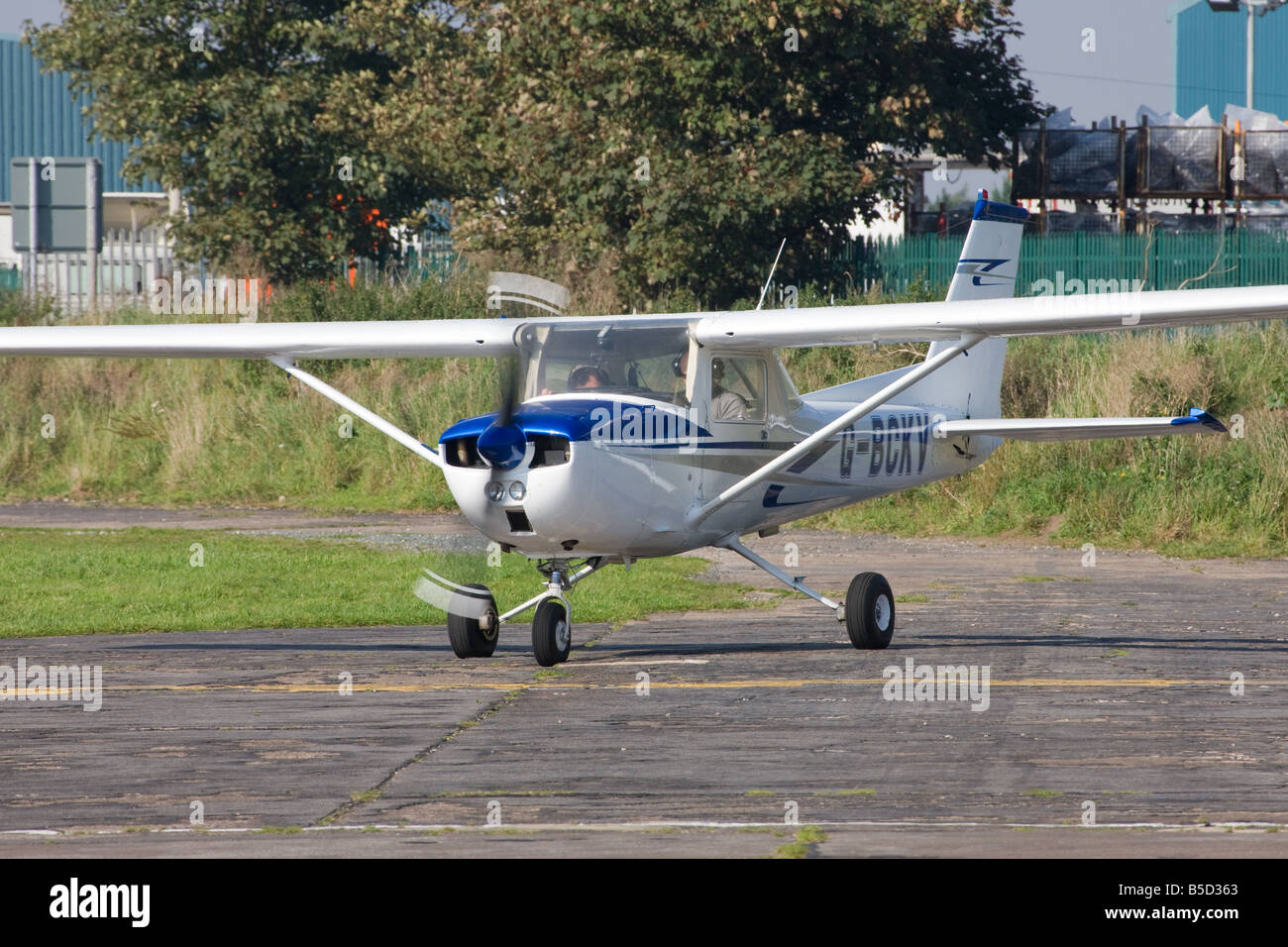 Reims Cessna FRA150L Aerobat G-BCKV taxiing to runway to take-off from Sandtoft Airfield Stock Photo