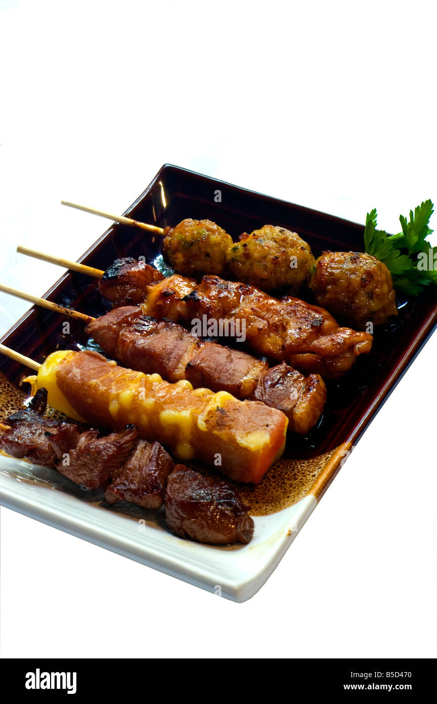 'Japanese Food' 5 Different Broilers Yakitori Isolated Grilled Cheese Beef Chicken Meat Ball restaurant 'take away' skewer Stock Photo
