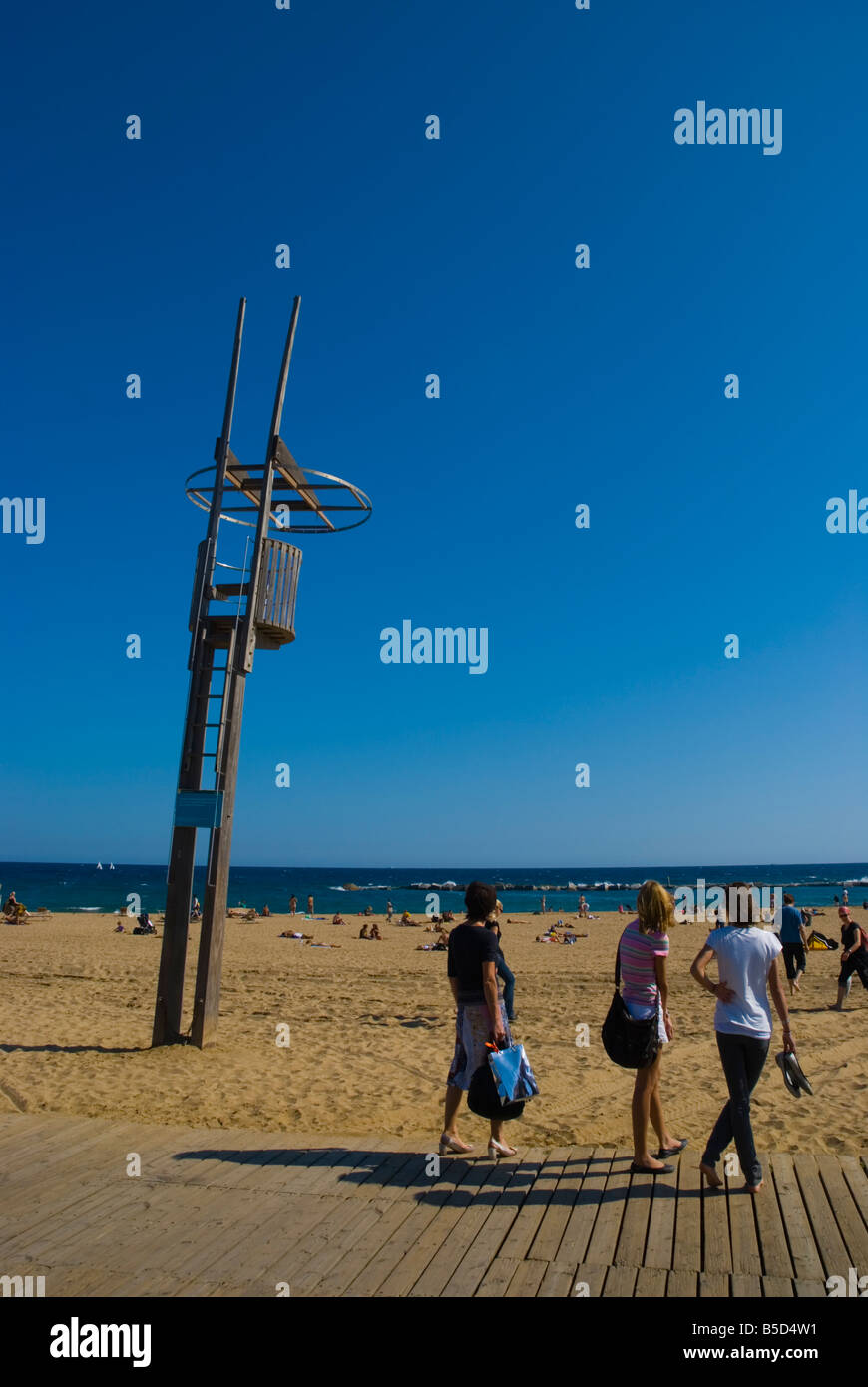 People at Platja de la Barceloneta beach in Barcelona Spain Europe Stock Photo