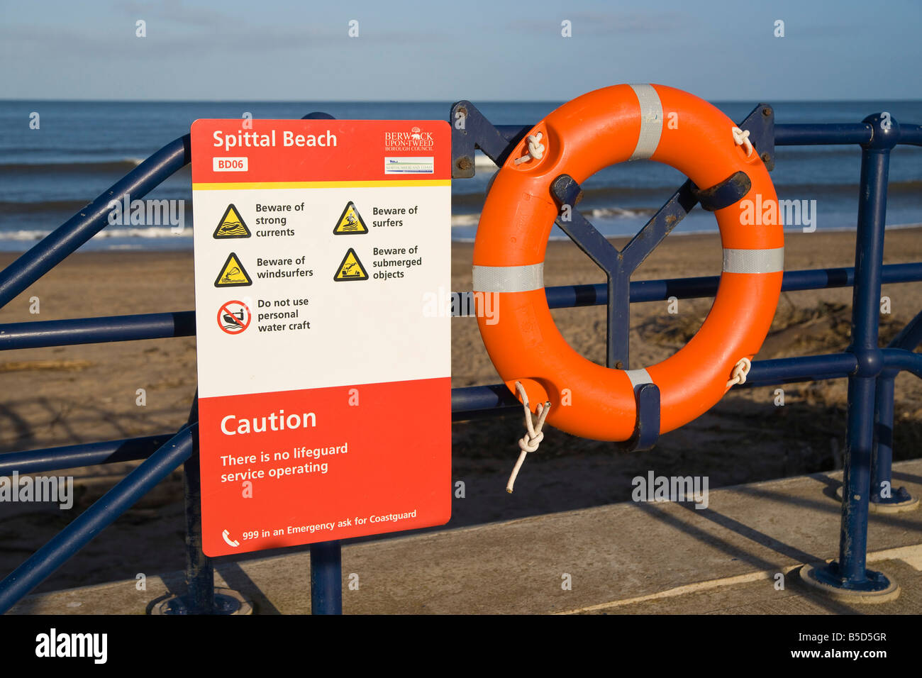 Spittal beach mouth of River Tweed near Berwick warning signs for water sports and current dangers Stock Photo