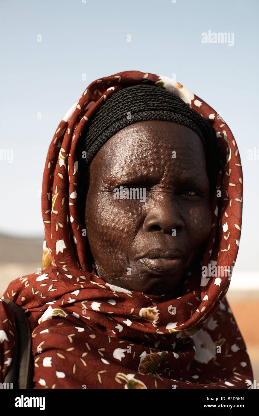 South Sudanese woman bearing tribal scarification markings, Khartoum, Sudan, Africa Stock Photo