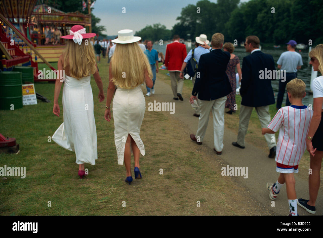 Blondes, fashion riverbank wanderers, Henley Royal Regatta, Oxfordshire, England, Europe Stock Photo