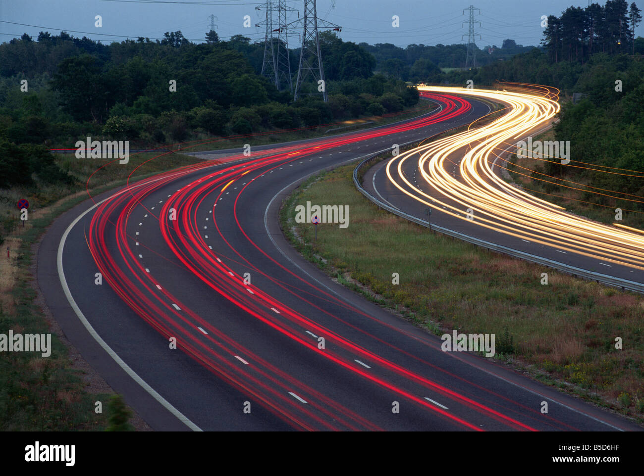 Light trails on the Guildford by pass at dusk in Surrey England R Rainford Stock Photo