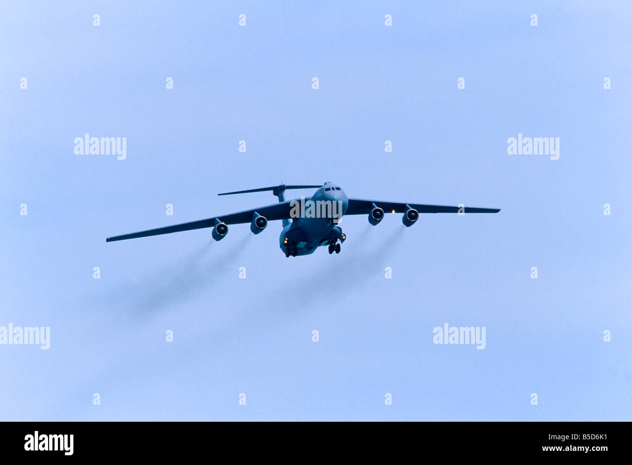 US Air Force C-141 cargo plane, in flight Stock Photo