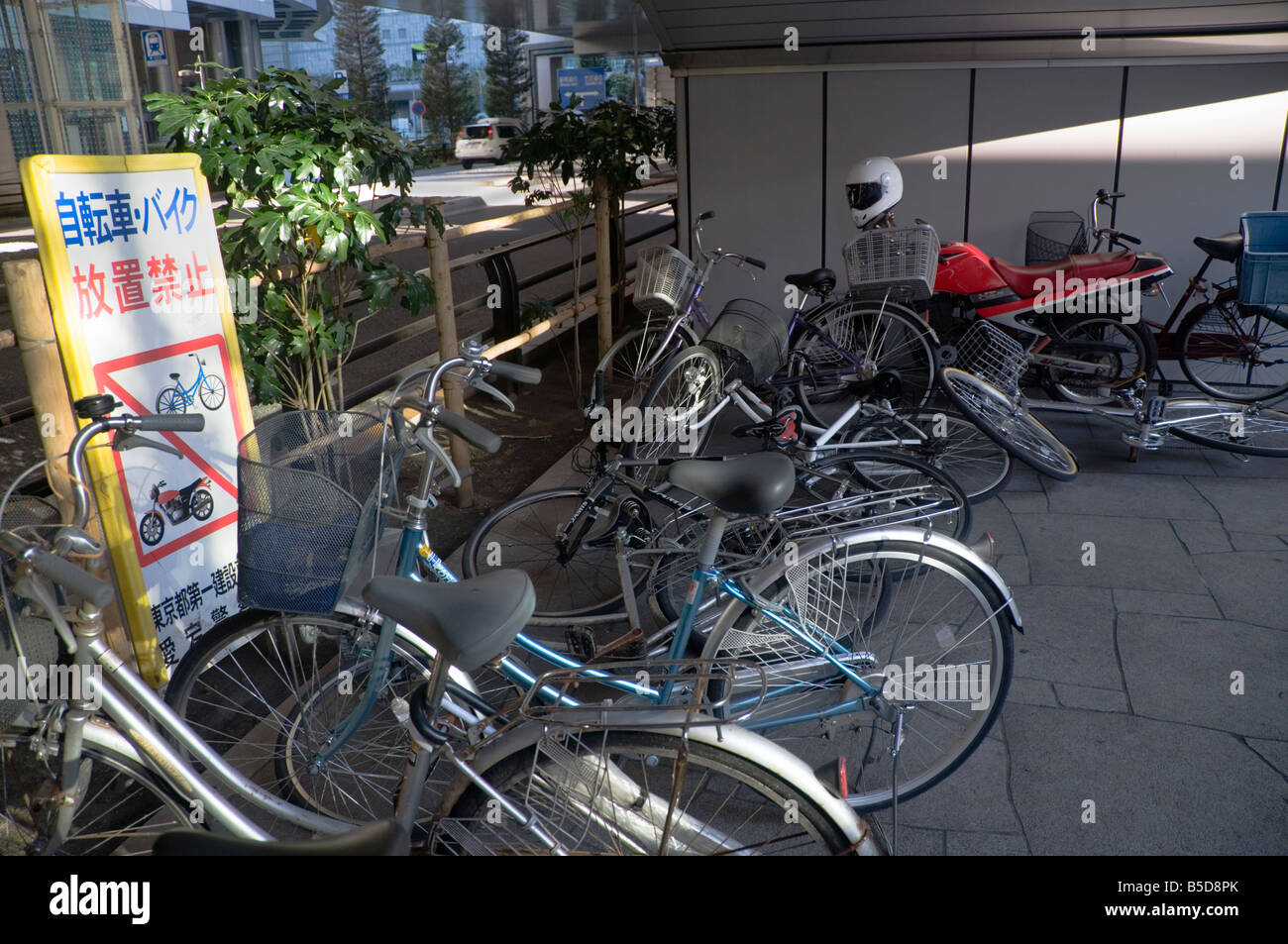 Illegally parked bikes in Shiodome, Minato, Tokyo, Japan Stock Photo