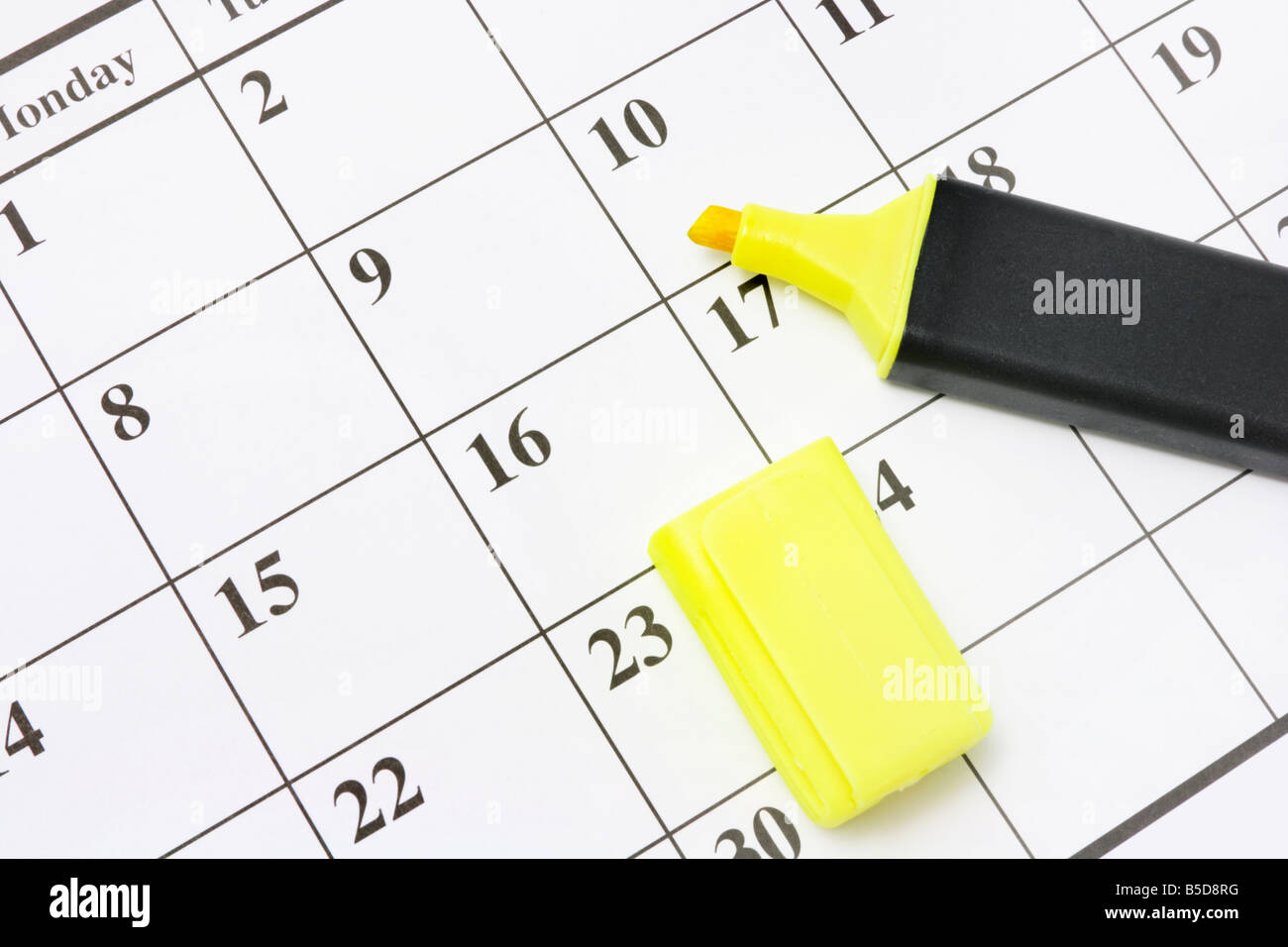 Yellow Marker Pen on Calendar Stock Photo