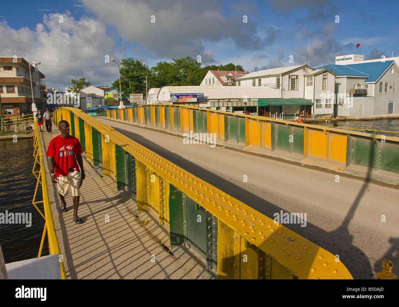 BELIZE CITY BELIZE People on the Swing Bridge which crosses Haulover Creek in downtown Belize City Stock Photo