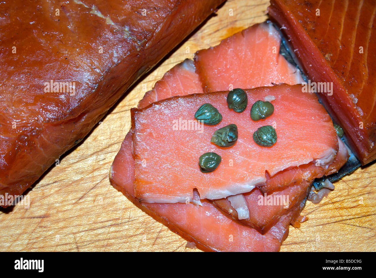 Slices of freshly smoked wild Pacific red king chinook salmon lox with