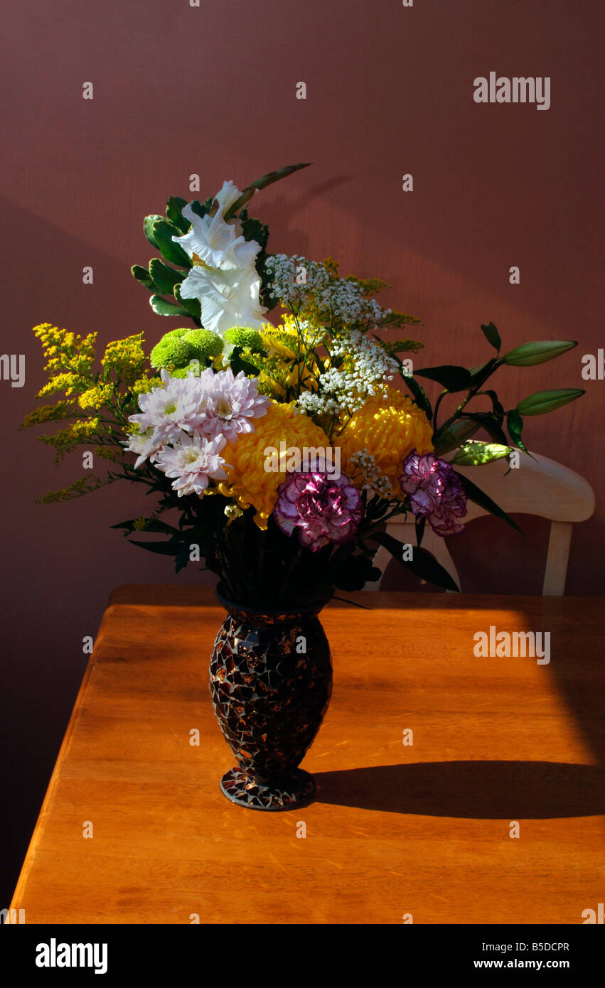 A vase of assorted flowers Stock Photo Alamy