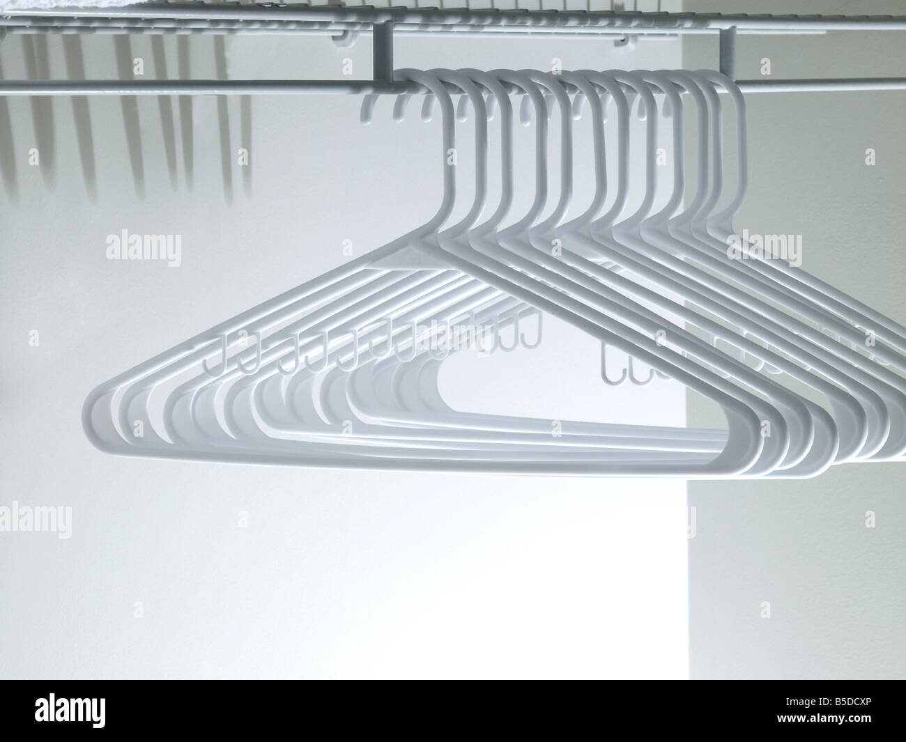 Coat hangers white wire hi-res stock photography and images - Page 2 - Alamy