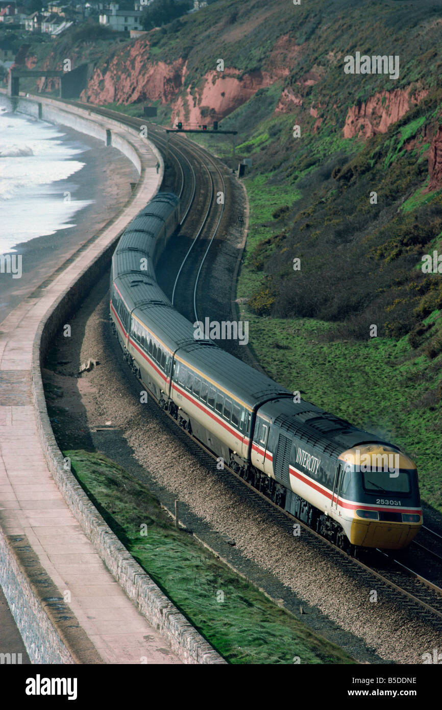 Aerial view over the H S 125 Intercity train westbound along coast near Langtone Rock Devon England UK I Griffiths Stock Photo