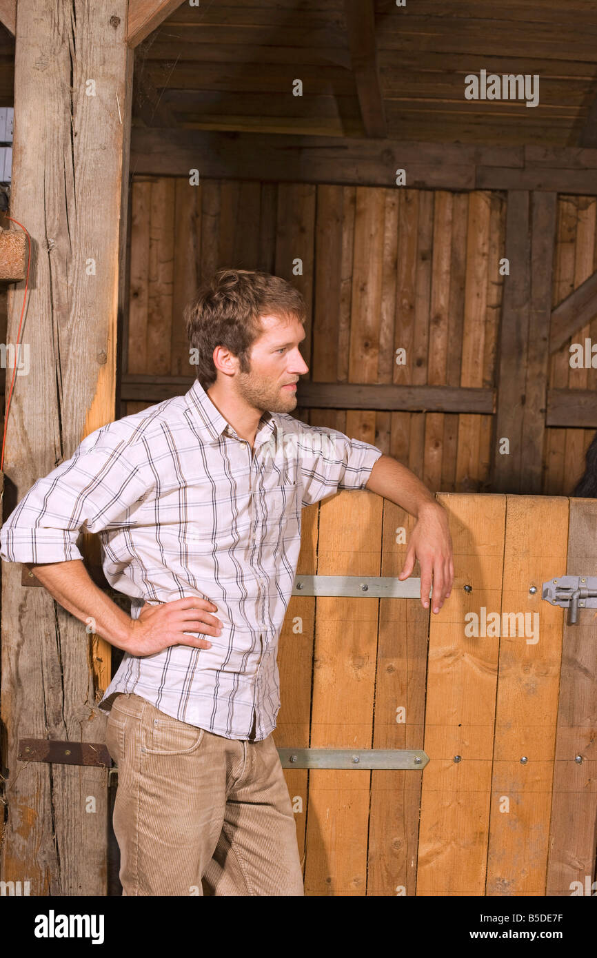 Man leaning on horse hires stock photography and images Alamy