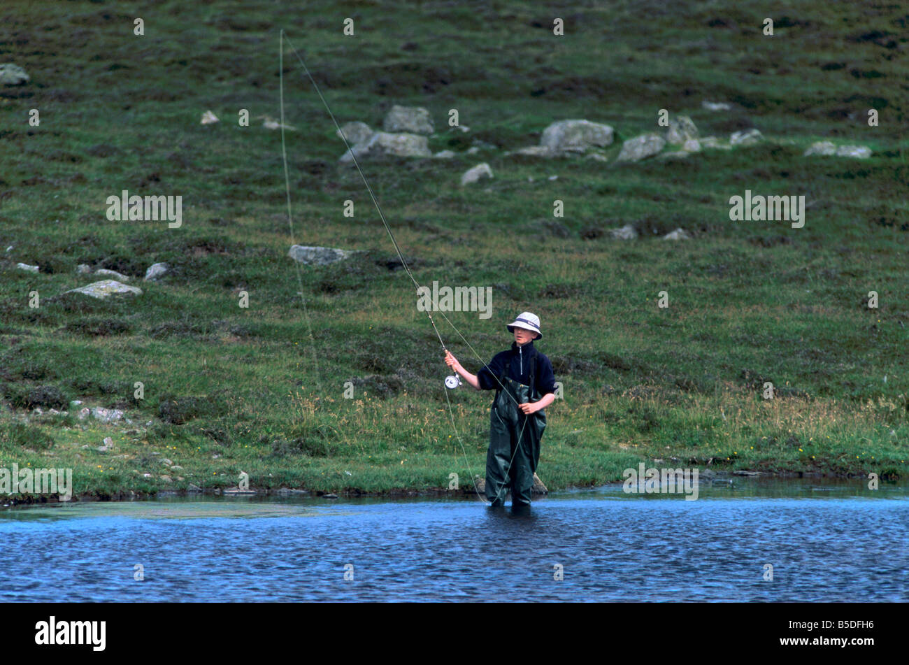 Fly fishing for trout in a loch, Shetland Islands, Scotland, Europe Stock Photo Alamy