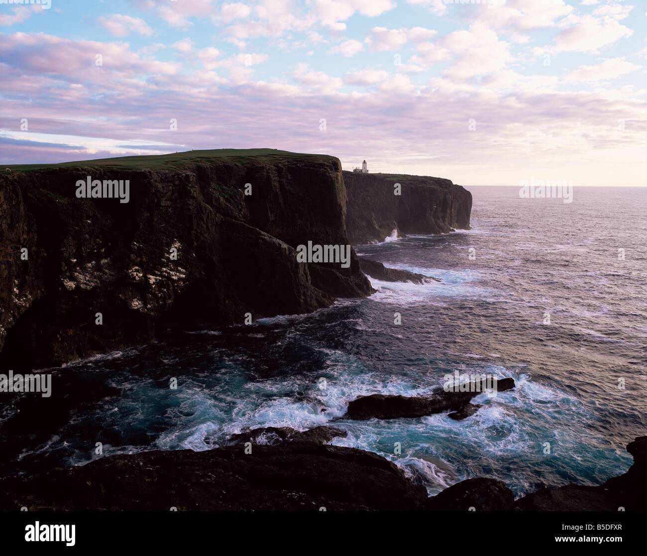 Sunset over Eshaness basalt cliffs, Eshaness, Northmavine, Shetland Islands, Scotland, Europe Stock Photo