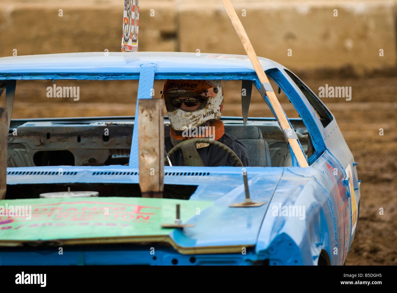 Driver in a demolition derby Stock Photo