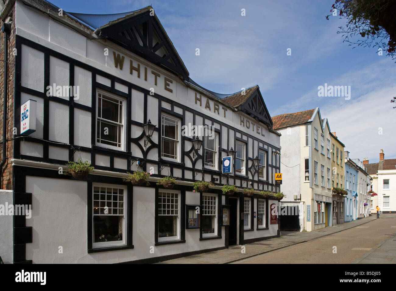 Wells Market Place White Hart hotel town center typical houses Somerset Great Britain United Kingdom Stock Photo