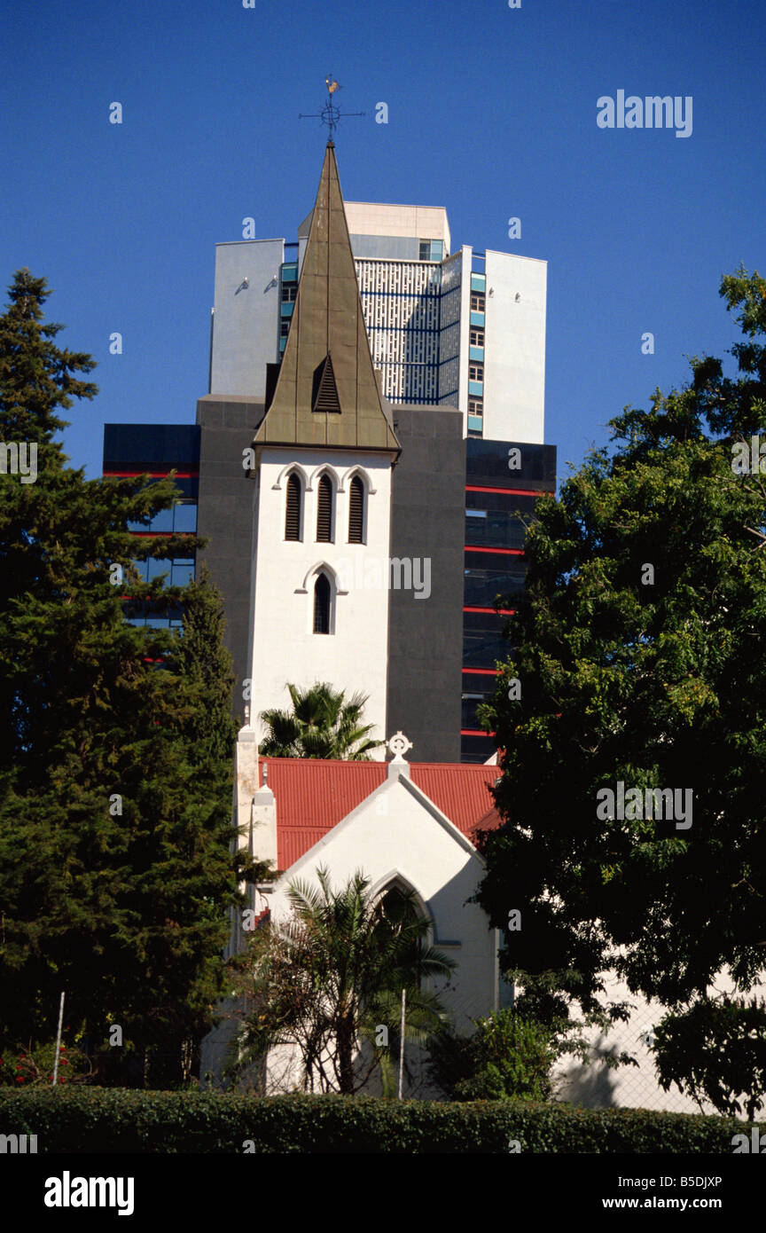 Church and modern buildings, Harare, Zimbabwe, Africa Stock Photo