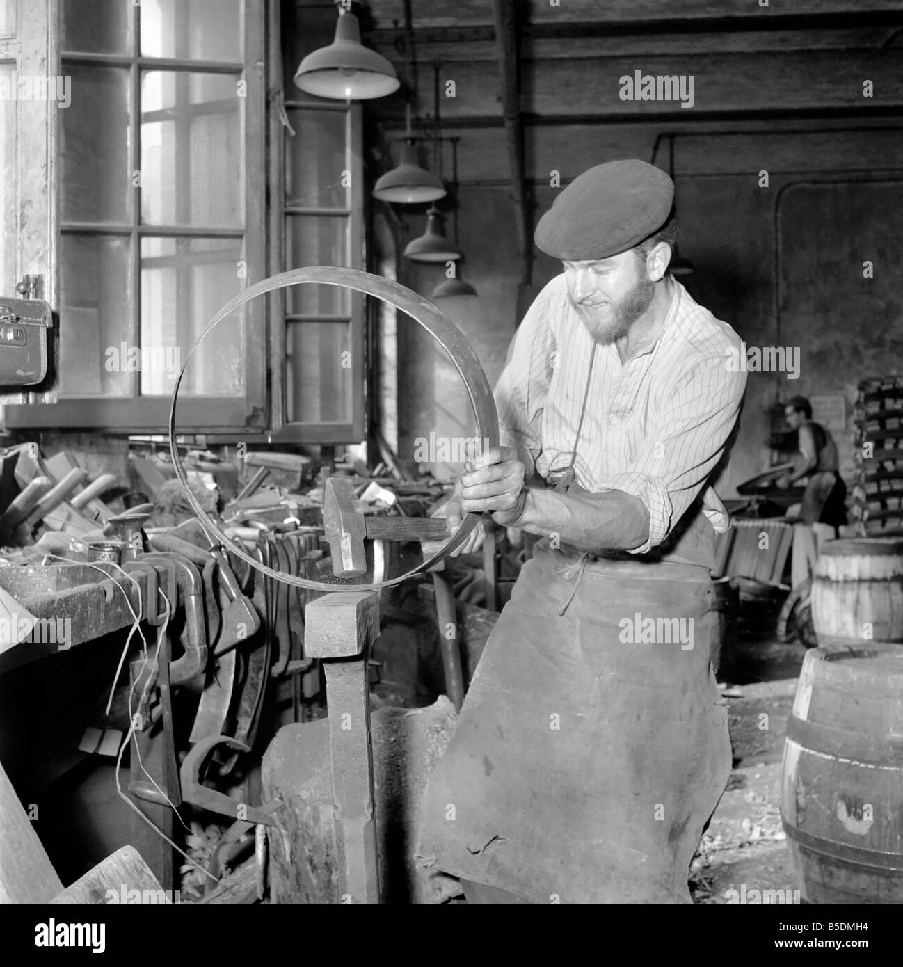 Coopers making beer barrels at the Whitbread brewery. October 1958