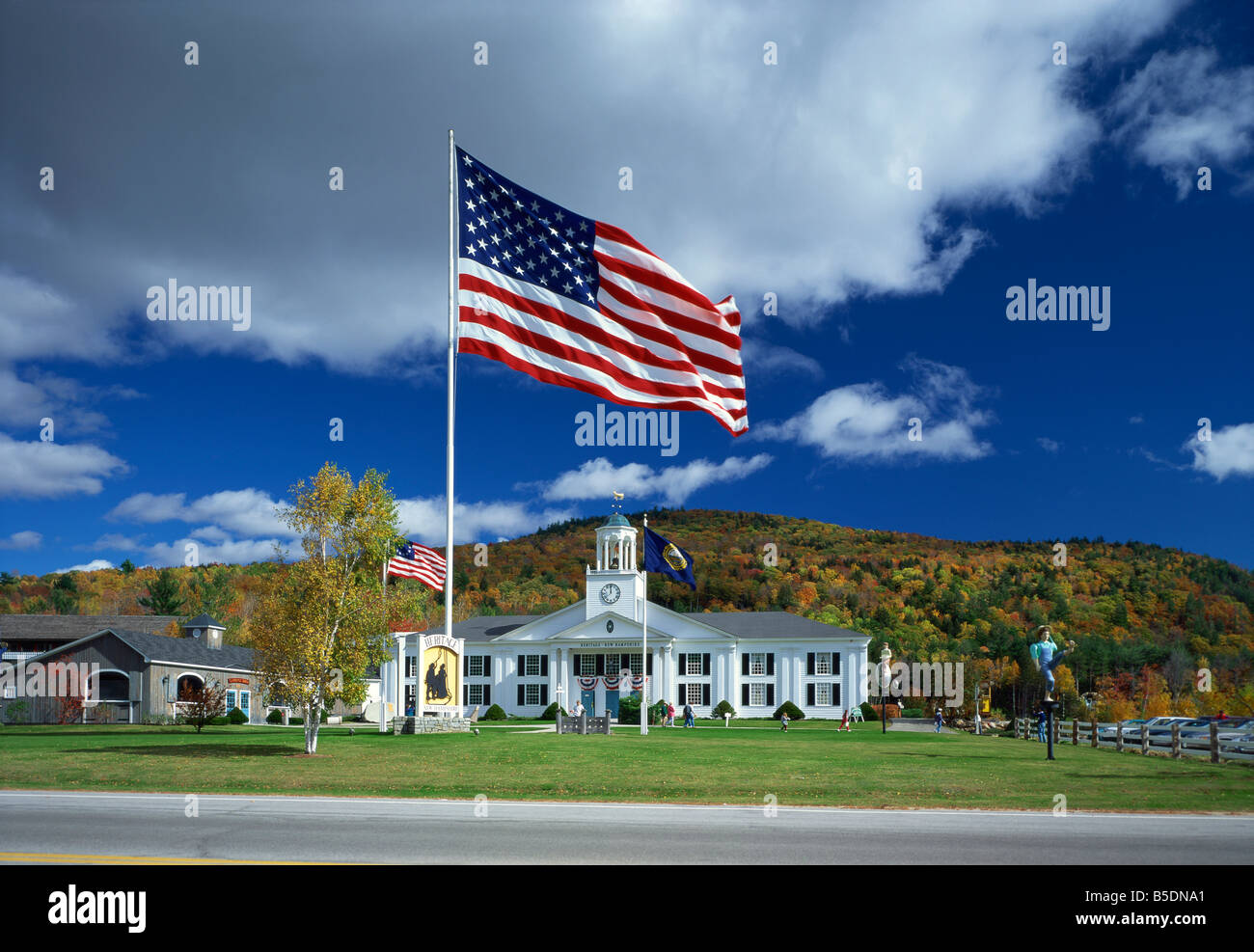 The Stars & Stripes in front of the Heritage Centre, White Mountain National Park, New Hampshire, New England, USA Stock Photo