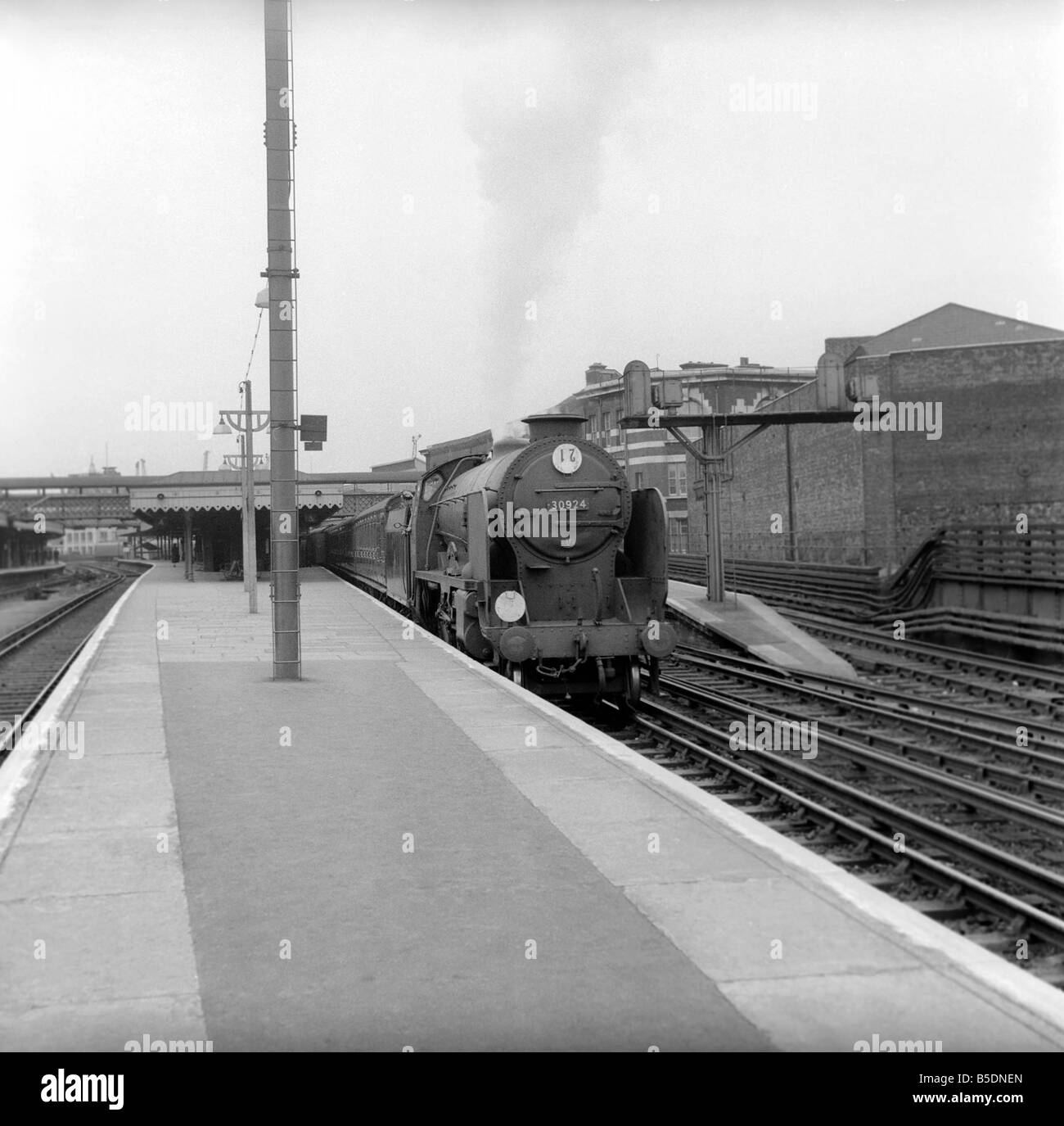 The Hailey Bury express steam train pulls in to Hastings station. May 1957 A380a Stock Photo