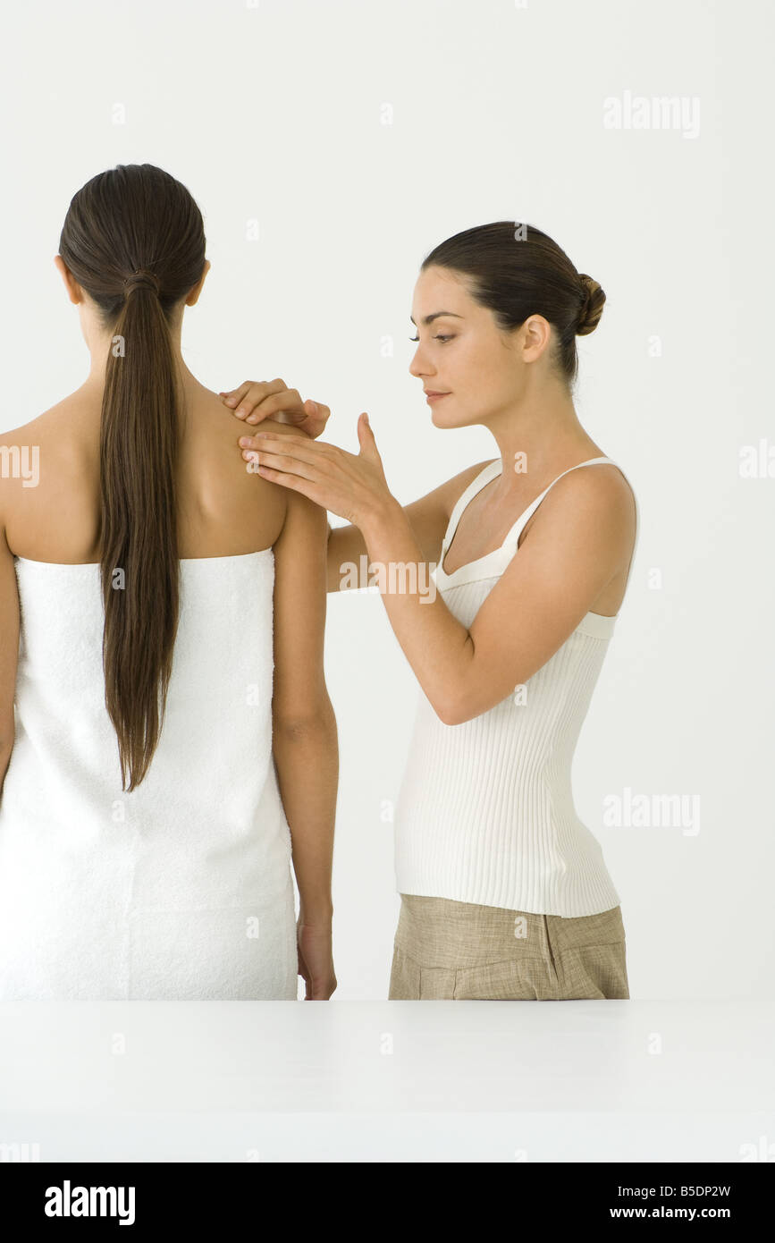 Woman receiving shoulder massage therapy Stock Photo Alamy