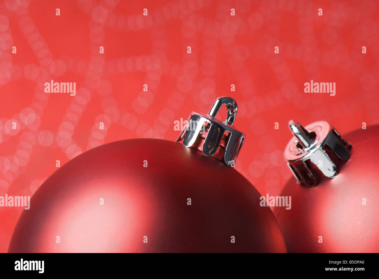 Two red Christmas tree ornaments, close-up Stock Photo