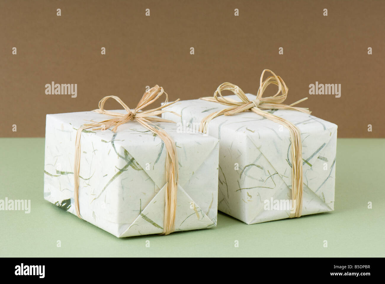 Two gift wrapped presents side by side Stock Photo