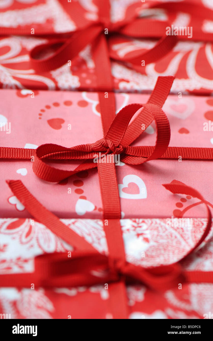 Three gift wrapped presents, cropped Stock Photo