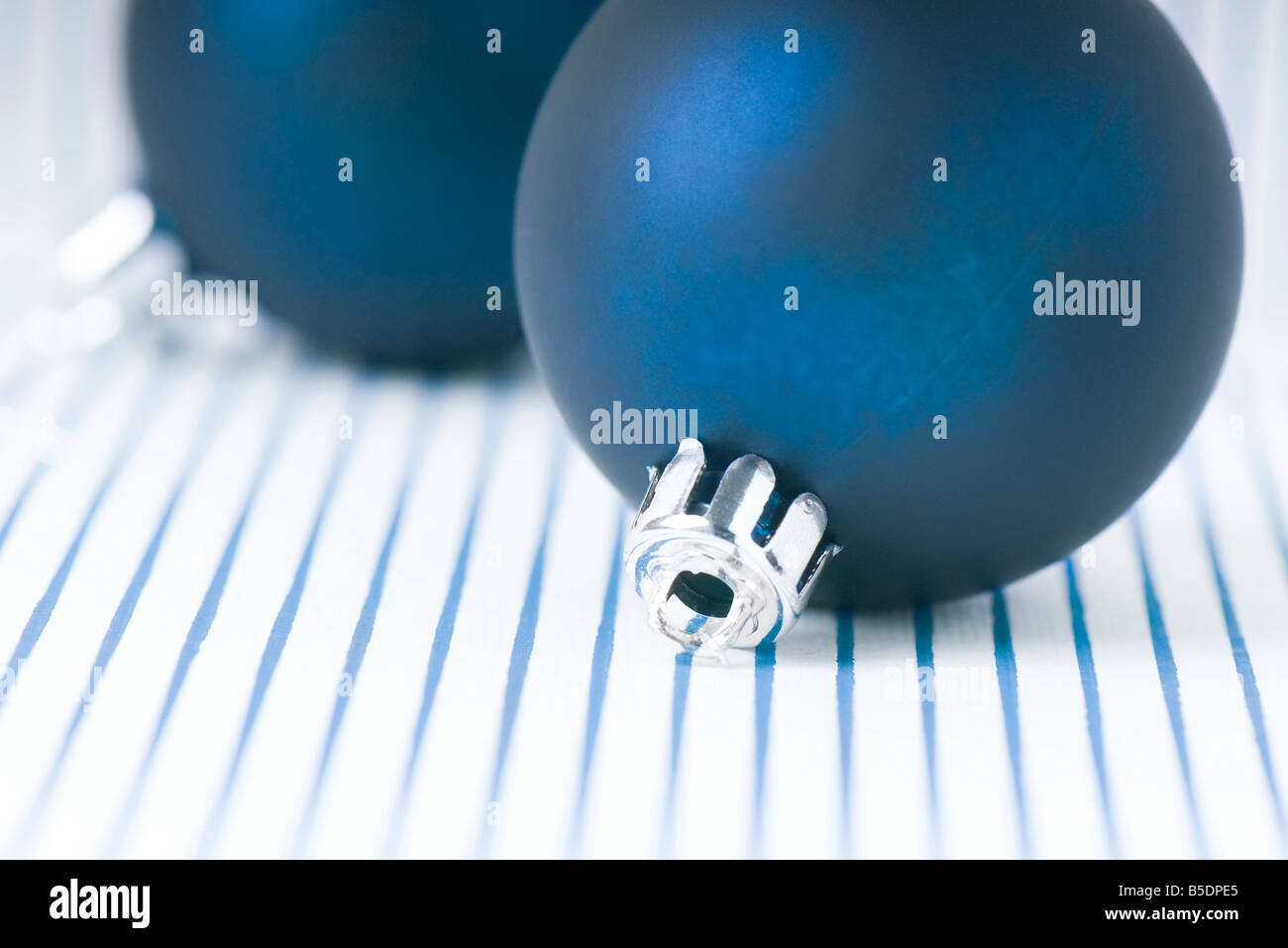 Two blue Christmas tree ornaments Stock Photo