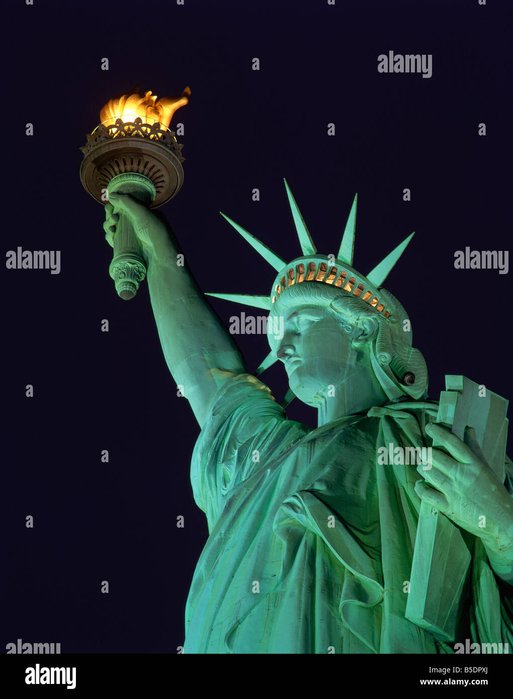 Close up of the Statue of Liberty illuminated at night in New York USA