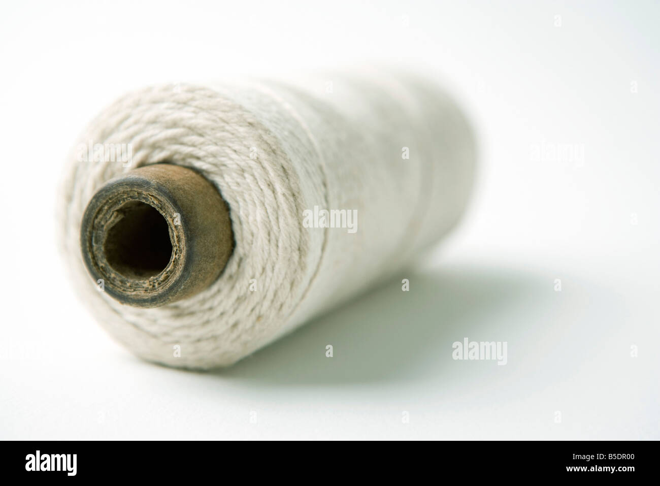 End of spool of string, closeup Stock Photo Alamy