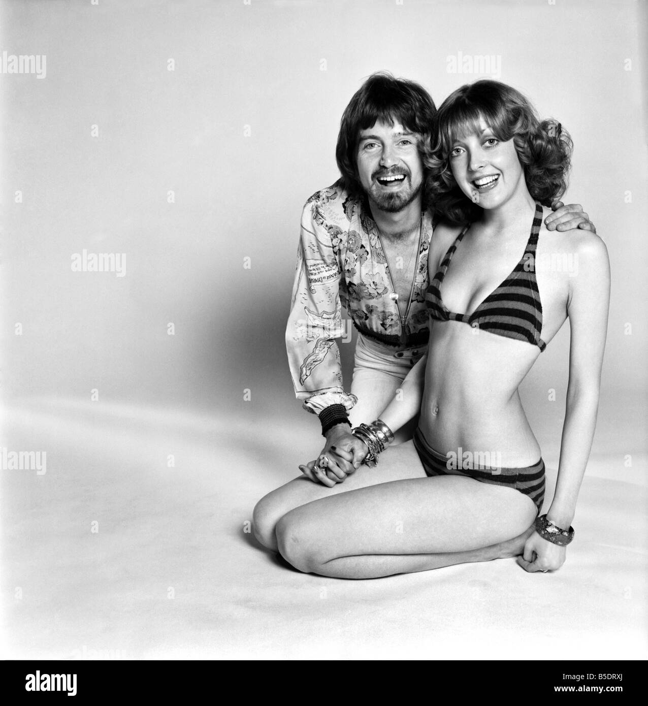 Couple wearing 1970s fashion picture