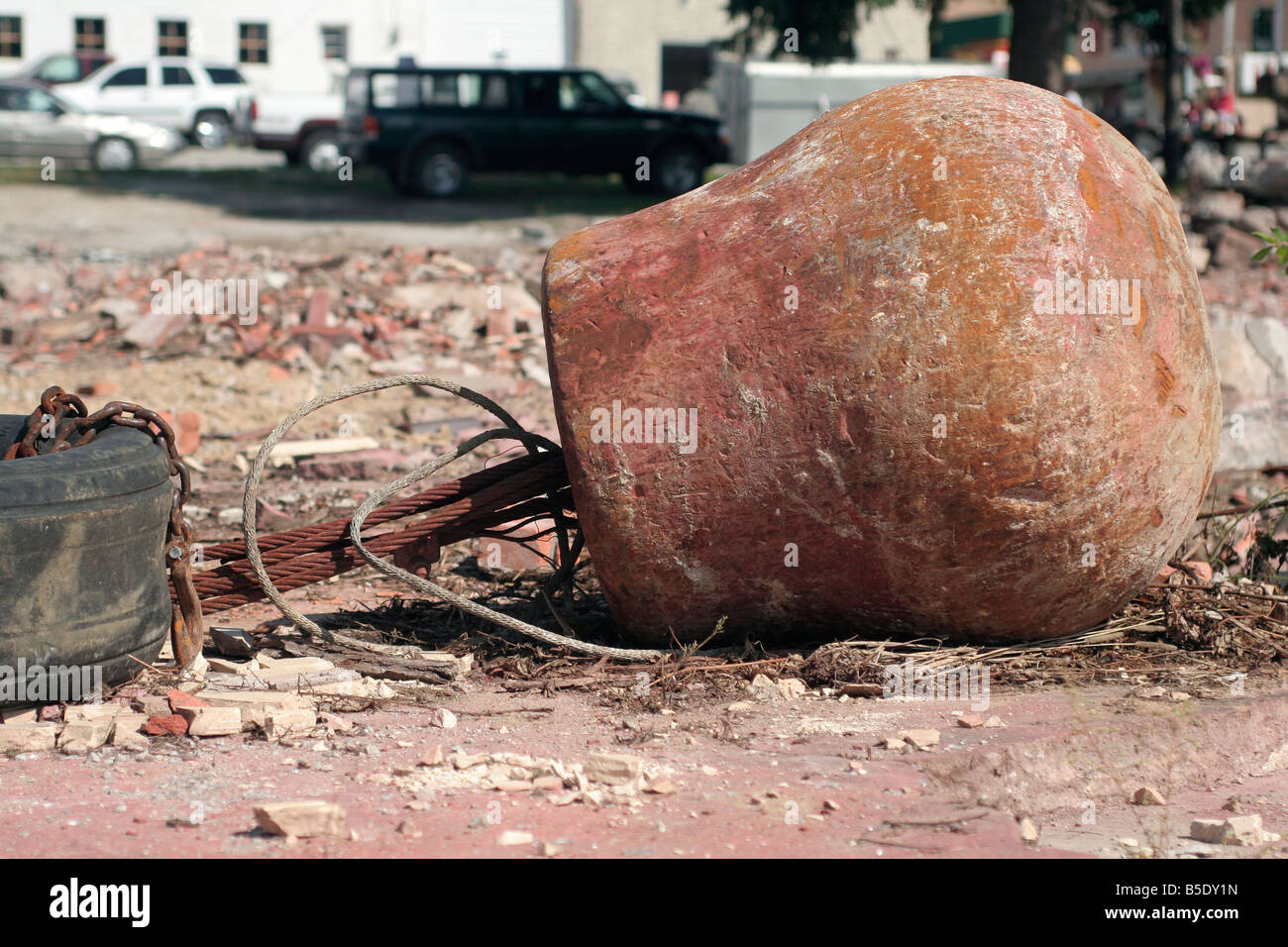 Large wrecking ball on destroyed building Stock Photo