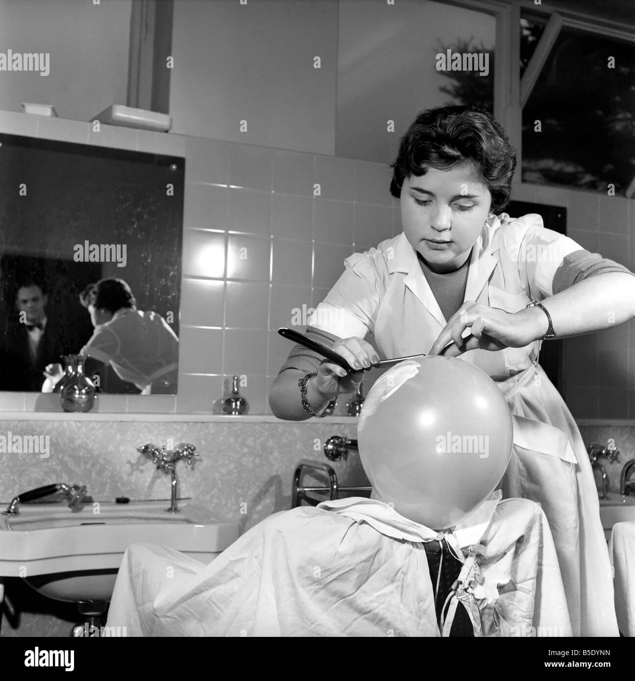 Women barbers training with cut throat razors, learn how to shave by