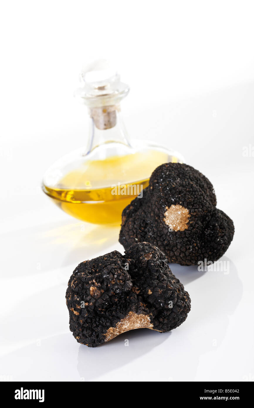 Black Truffles and a bottle of oil, closeup Stock Photo Alamy