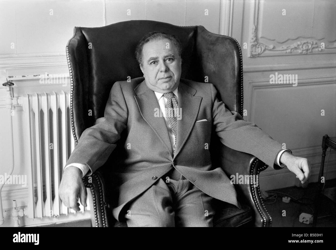 Harry Saltzman, co-producer of the Bond films, in his London Office Seotember 1975 Stock Photo