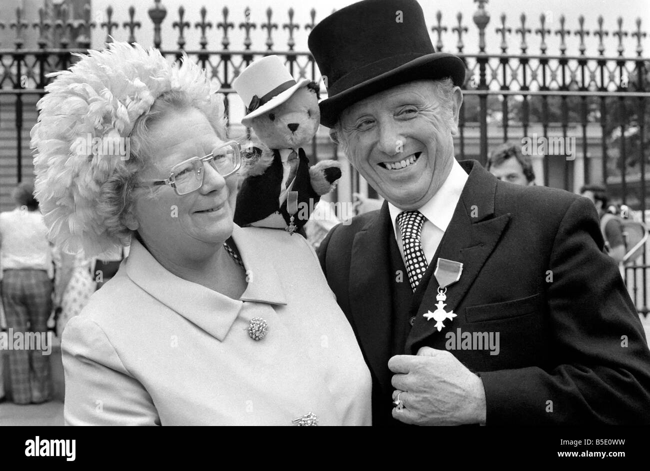 Sooty, Harry Corbett and wife at investiture at Buckingham Palace. Jult