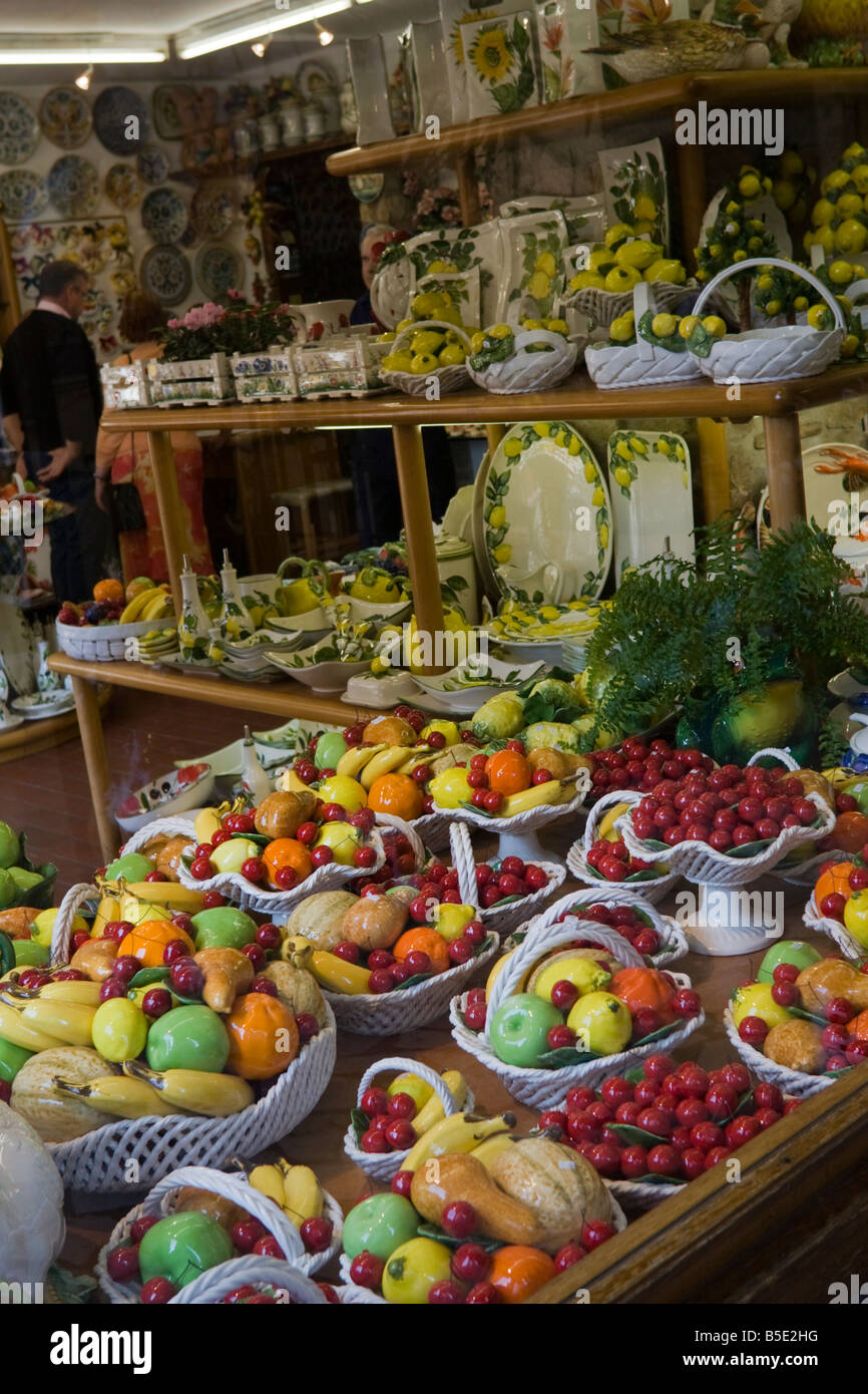 Colourful ceramic ornamental artificial fruit display in shop hires stock photography and