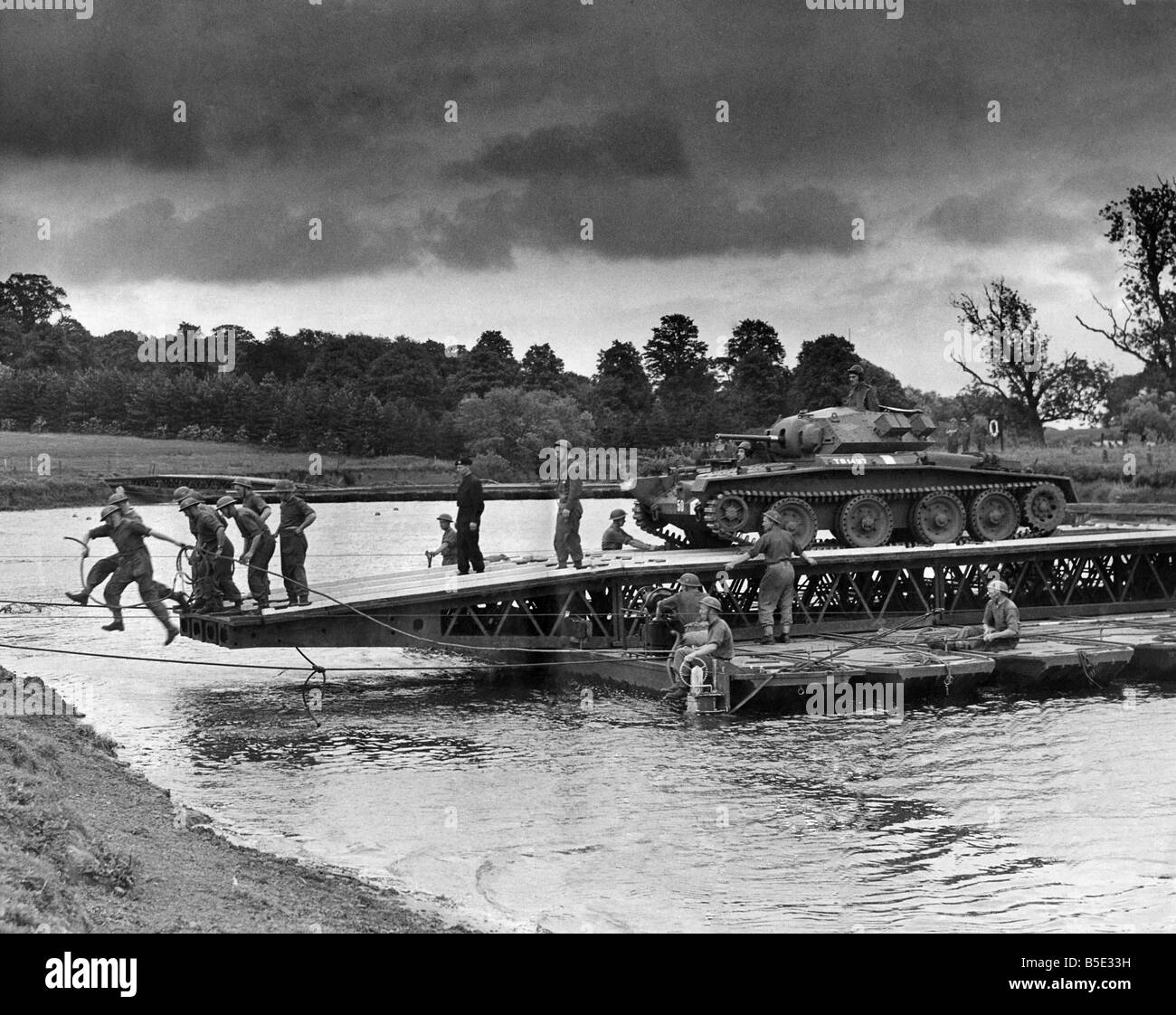 An assault river crossing by infantry and R.E. personnel somewhere in