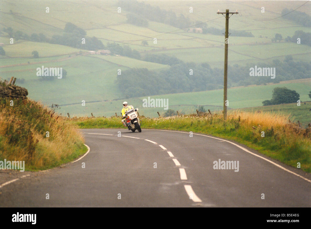 Police officer Dave Lyall patrols the A686 between Haydon Bridge and Alston on his motorcycle Stock Photo
