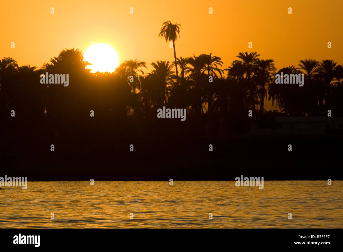 Sunset on the Nile River in Luxor Egypt Stock Photo