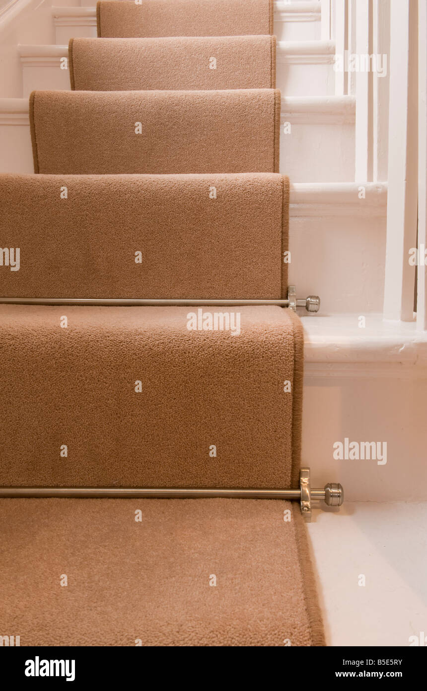 stair rods on a carpet Stock Photo Alamy