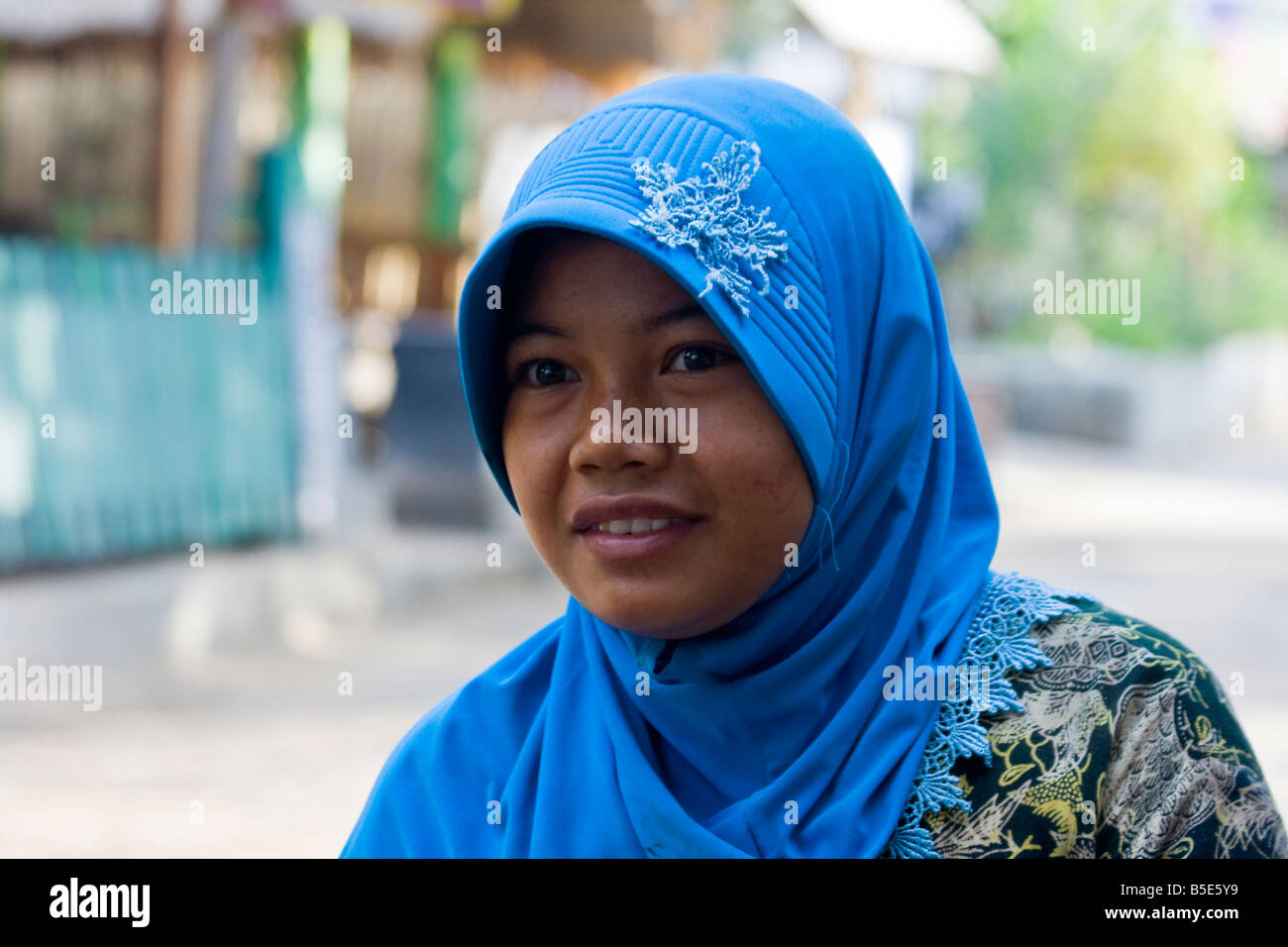 Teenage Muslim Girl on Gili Trawangan on Lombok Island in Indonesia Stock Photo